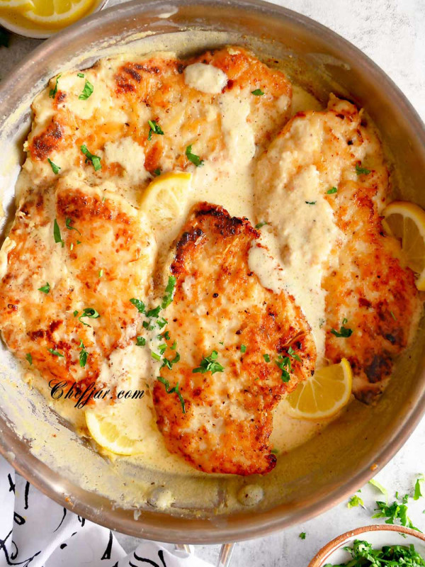 creamy lemon chicken in a skillet