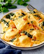 ravioli in a creamy sauce on the plate