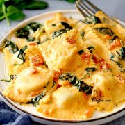 ravioli in a creamy sauce on the plate