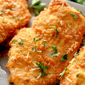 baked breaded chicken cutlet on a plate