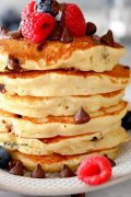 chocolate chip pancake recipe on a plate with berries