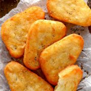 air fried hash browns board lined with parchment paper