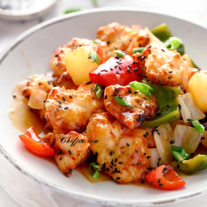 air fryer sweet and sour chicken with veggies and pineapple on a plate