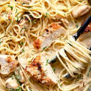 creamy lemon chicken pasta in a skillet
