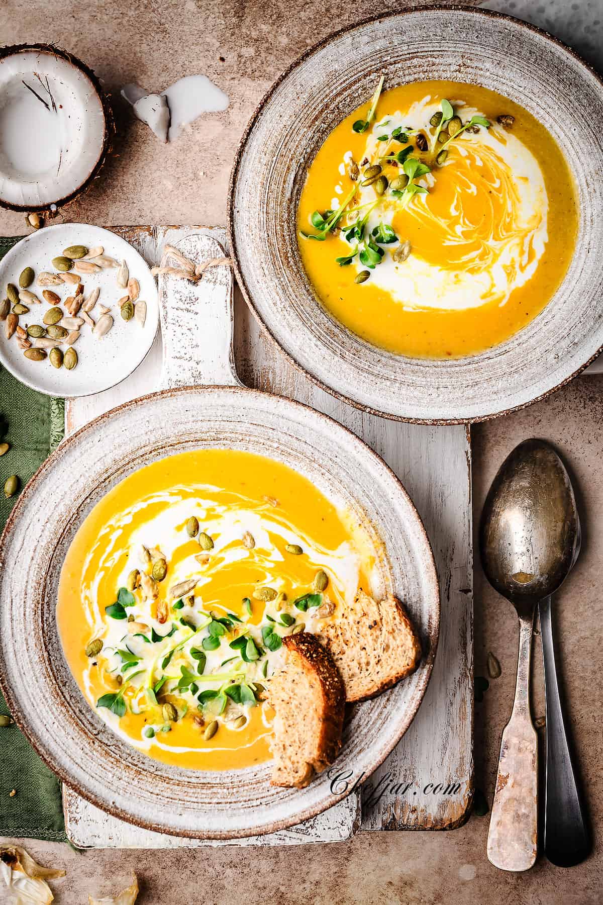 Two bowls of roasted butternut squash soup.