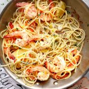 a skillet with lemon garlic butter shrimp pasta