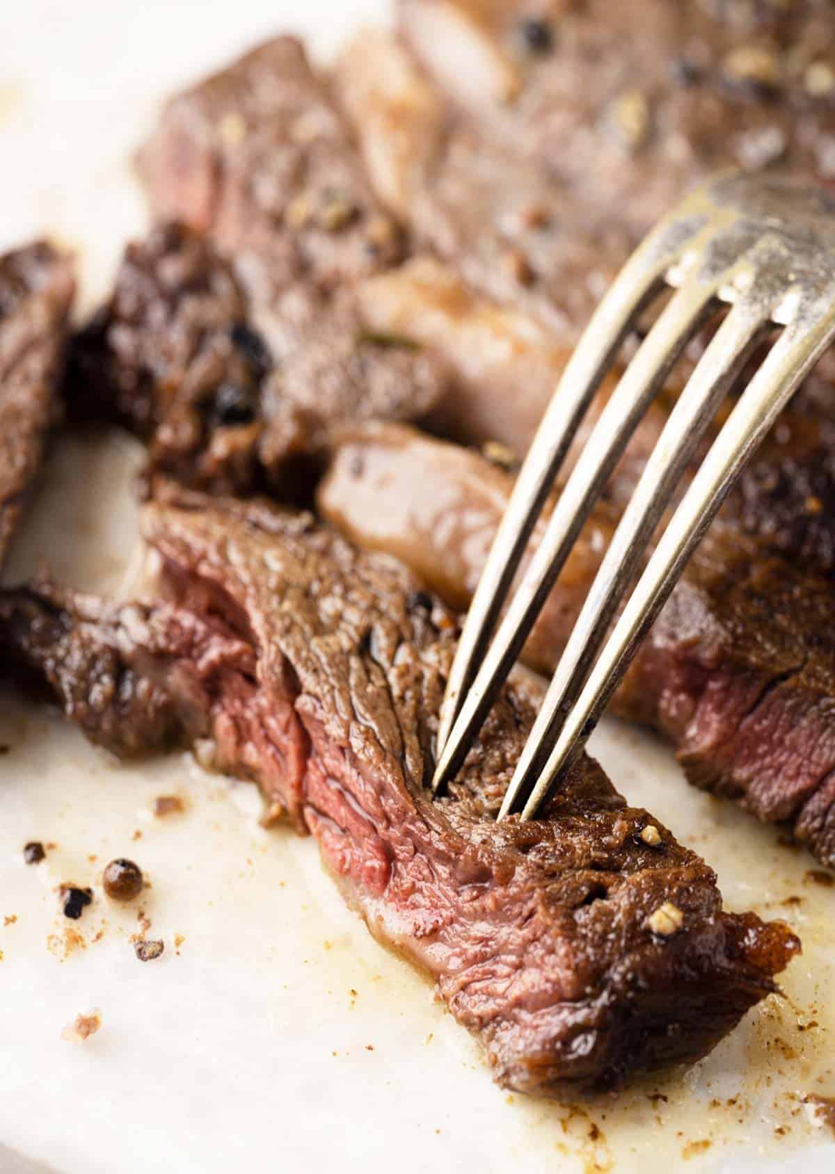 A close up shot of pan seared wagyu ribeye steak slice