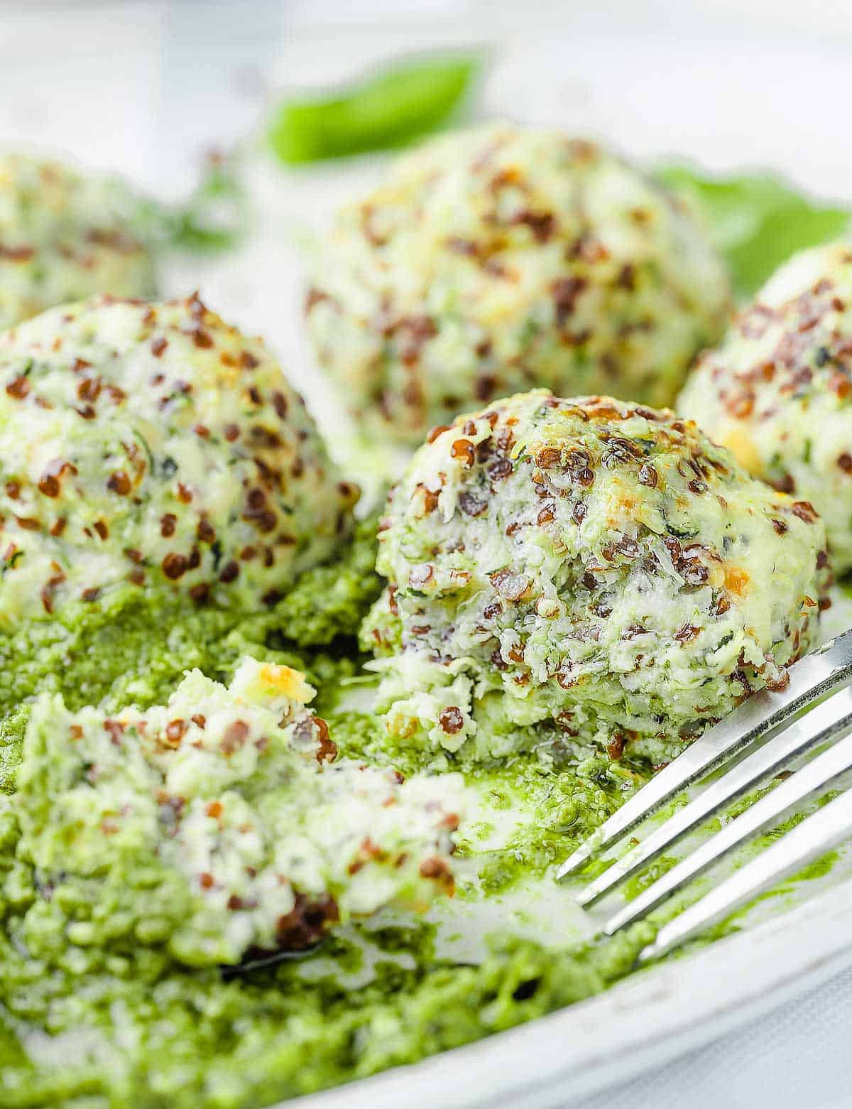 A close up image of chicken zucchini meatball.