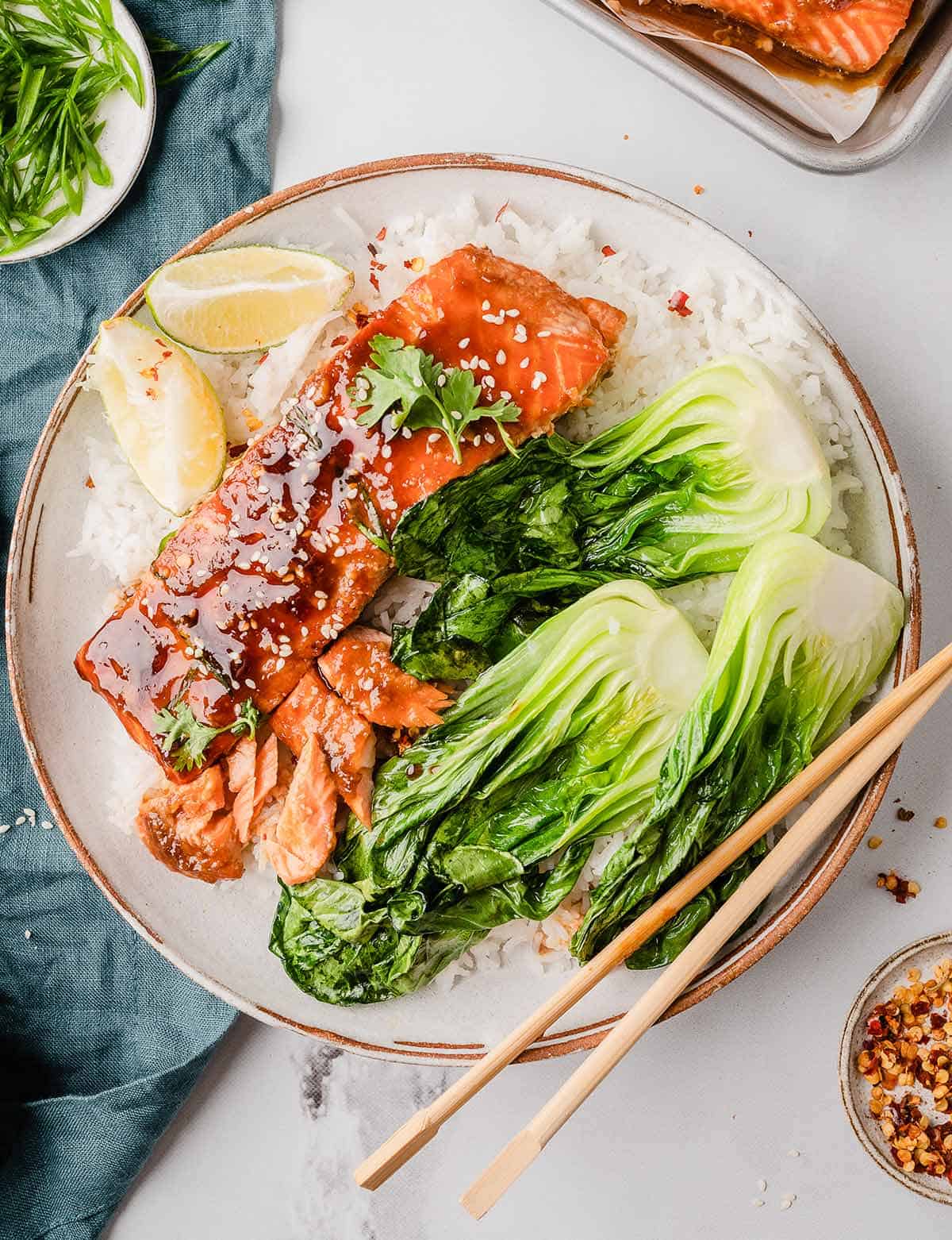 Top view of miso glazed salmon with steamed rice and bok choy