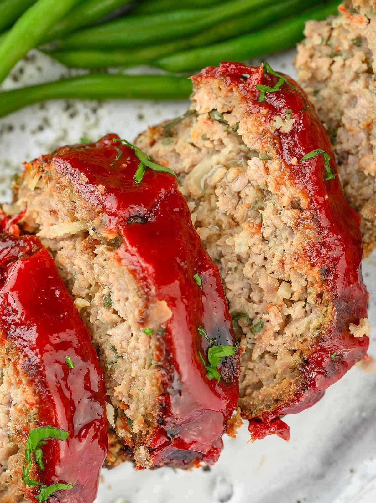 A close up image of air fryer meatloaf slices.#airfryermeatloaf #recipe #recipe #easy #airfryer #best #groundbeef