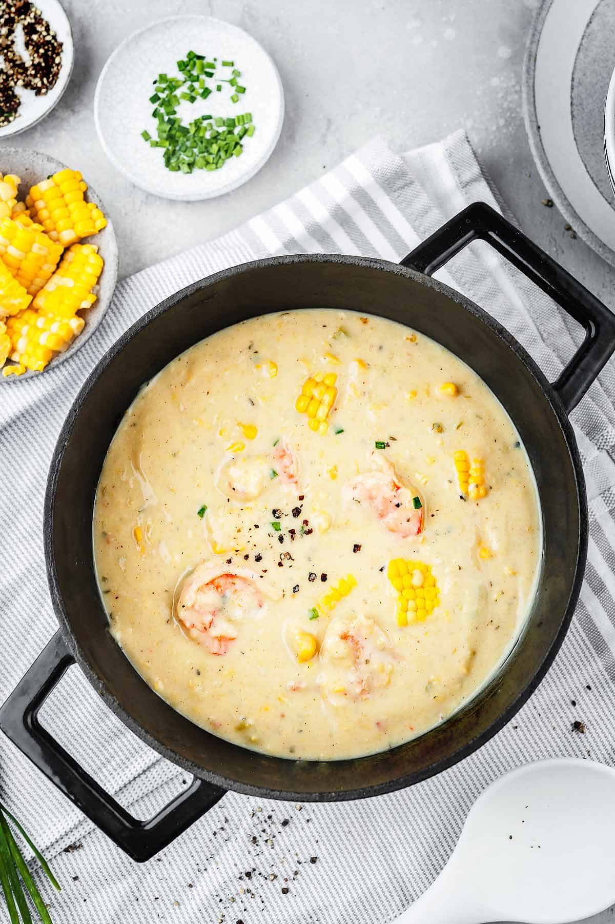 Shrimp and corn soup in a pot
