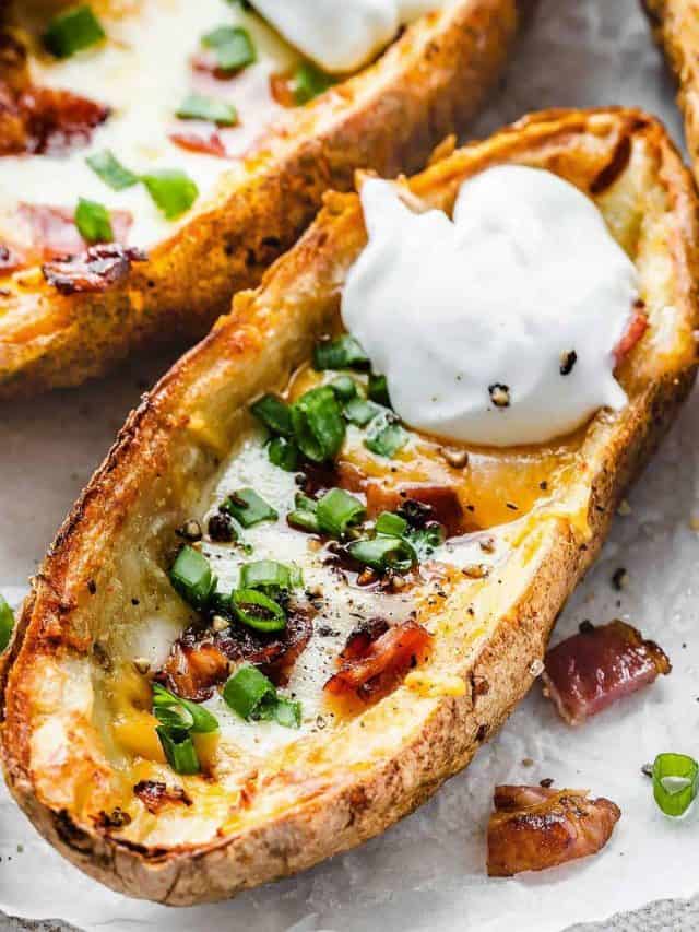 Super Crispy Air Fryer Potato skins are topped with smoked bacon, green onions, and plenty of sharp cheddar and Monterey Jack Cheese.