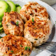 Turkey patties on white plate - Juicy and flavorful ground turkey patties served on a white plate.