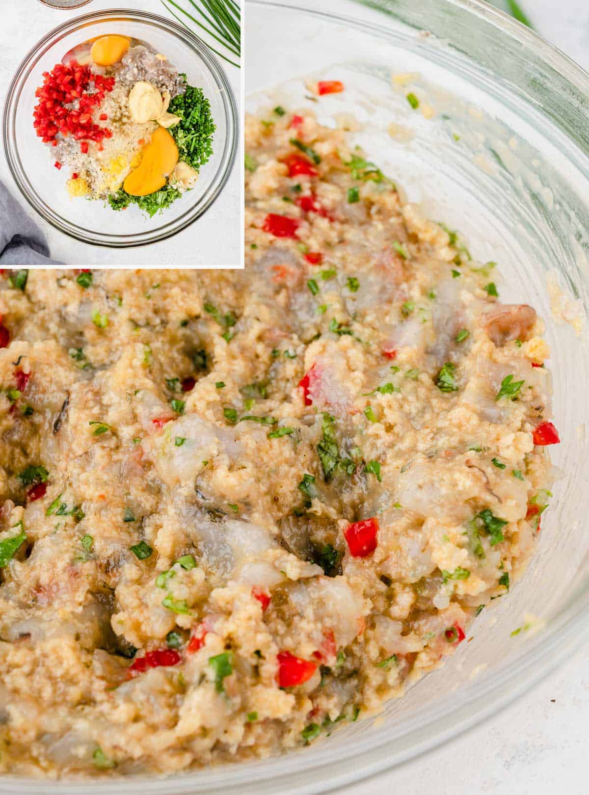 Shrimp meat mixture for the shrimp cakes in a large bowl.