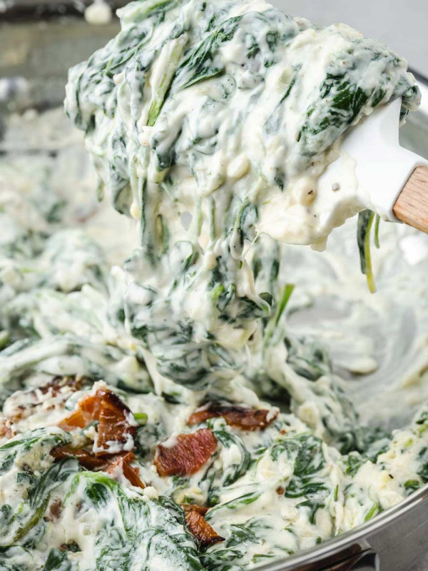 Bacon Boursin Creamed Spinach in skillet: A creamy spinach dish with crispy bacon and rich Boursin cheese.