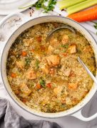 Hearty Leftover Turkey and Rice soup in a pot.
