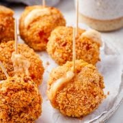 Chicken Cordon Bleu Bites served as appetizers on a plate with toothpicks.