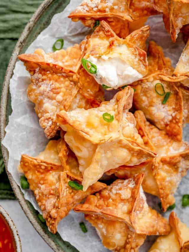 Close-up view of a perfectly air fried Shrimp Rangoon, showcasing its crispy golden-brown exterior and creamy shrimp filling.