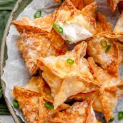 Close-up view of a perfectly air fried Shrimp Rangoon, showcasing its crispy golden-brown exterior and creamy shrimp filling.