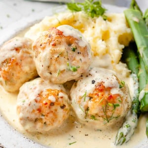 Close-up image of baked ranch chicken meatballs on the plate.