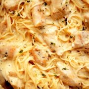 Close-up of creamy garlic parmesan chicken pasta .