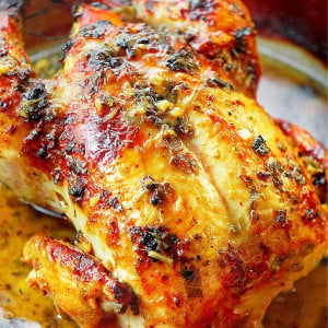 Mojo chicken in a skillet.