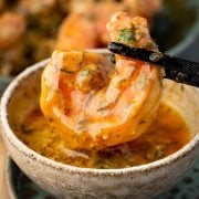 Juicy shrimp dipped in rich, buttery cowboy sauce with fresh herbs and a hint of heat.
