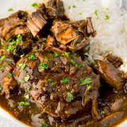 Tender smothered steak with rich brown gravy served over fluffy white rice.