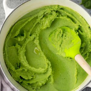 Creamy spinach mashed potatoes, smooth and fluffy green mashed potatoes in a pot.