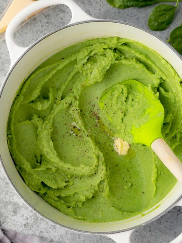 Creamy spinach mashed potatoes, smooth and fluffy green mashed potatoes in a pot.